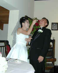 lydia_feeding_tom_cake.jpg (45231 bytes)